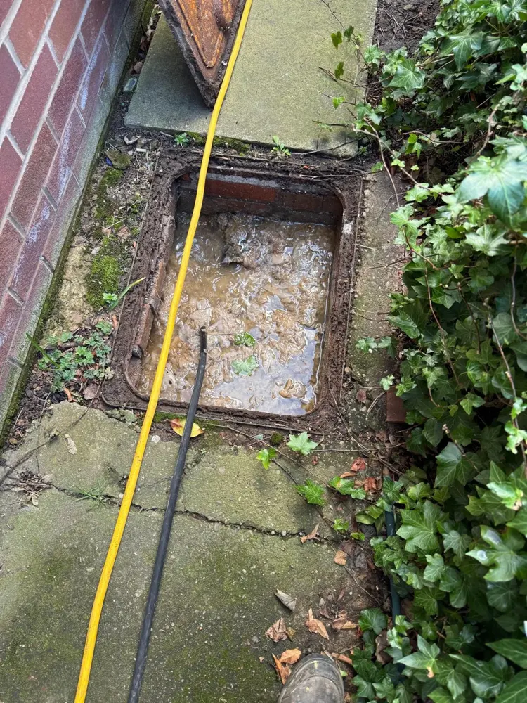 Yard drain being jetted